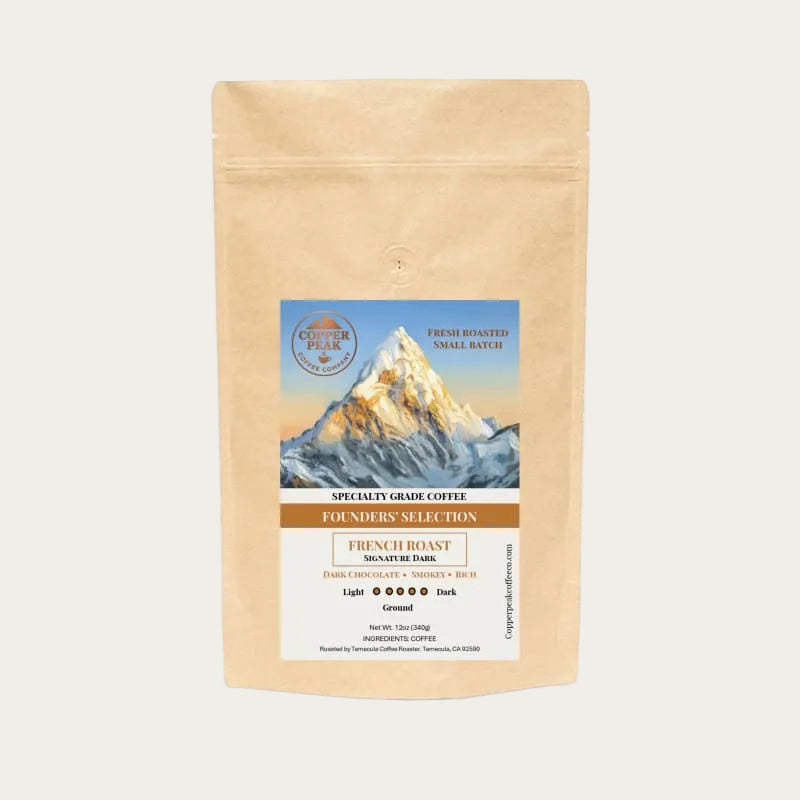 Kraft paper coffee bag with mountain graphic and brand logo on a white background